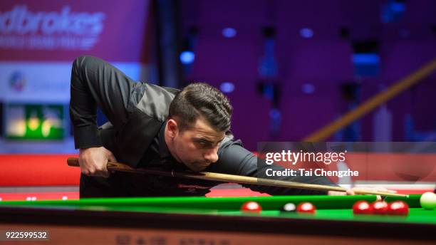 Michael Georgiou of Cyprus plays a shot during his second round match against Stephen Maguire of Scotland on day three of 2018 Ladbrokes World Grand...