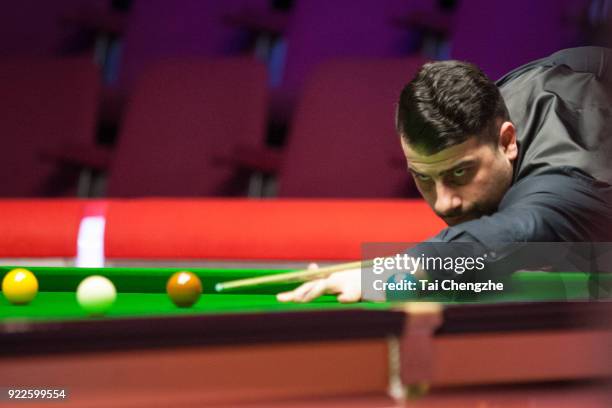 Michael Georgiou of Cyprus plays a shot during his second round match against Stephen Maguire of Scotland on day three of 2018 Ladbrokes World Grand...