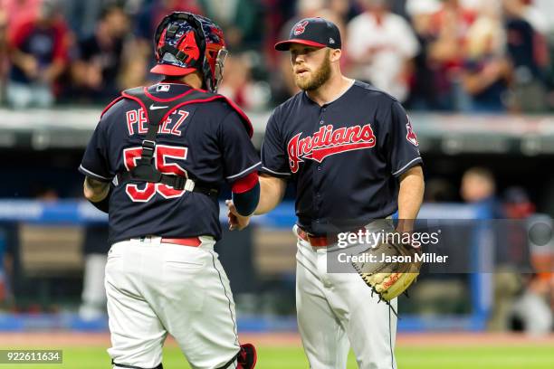 Catcher Roberto Perez celebrates with closing pitcher Cody Allen of the Cleveland Indians after the Indians defeated the Cincinnati Reds at...