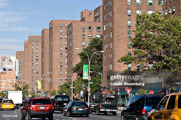Traffic travels along First Avenue near buildings in the Stuyvesant Town-Peter Cooper Village complex in New York, U.S., on Thursday, Oct. 22, 2009....