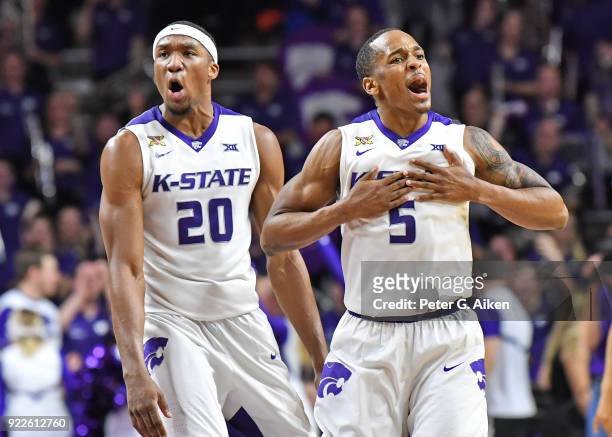 Barry Brown of the Kansas State Wildcats and Xavier Sneed of the Kansas State Wildcats react after defeating the Texas Longhorns on February 21, 2018...