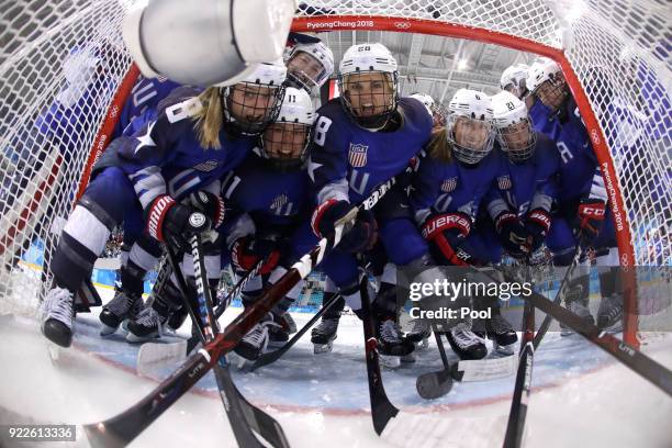 Team United States players pose in the goal prior to the Women's Gold Medal Game against Canada on day thirteen of the PyeongChang 2018 Winter...