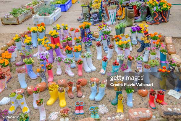 old wellington boots at st monans harbour, scotland - wellington harbour stock pictures, royalty-free photos & images