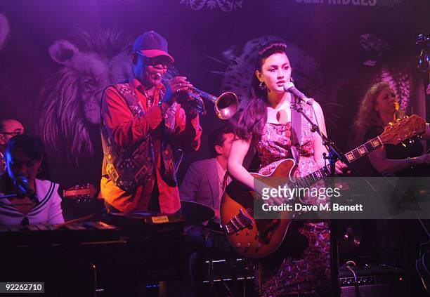 Kitty, Daisy & Lewis perform on stage during the launch party for the new limited edition Edun women's t-shirts and t-dresses hosted by Edun and...