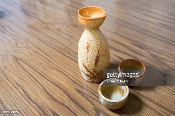 traditional japanese food, hot japanese rice wine (sake) - sake stock pictures, royalty-free photos & images