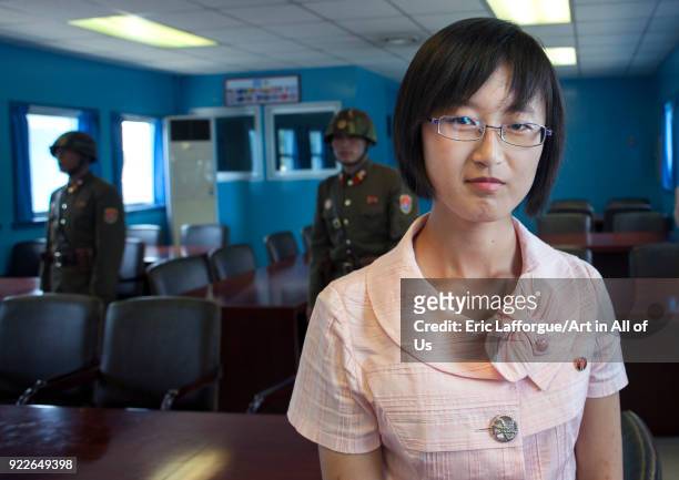 North Korean guide in the conference room of the United Nations on the demarcation line in the Demilitarized Zone, North Hwanghae Province,...