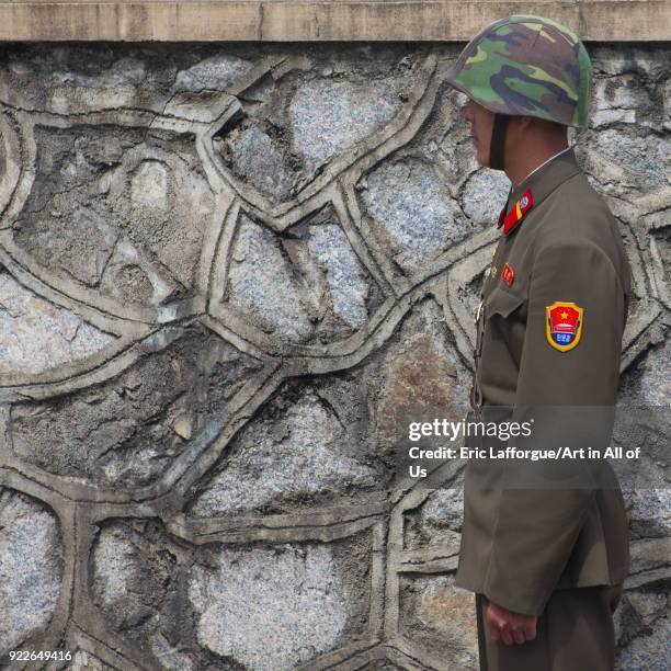 North Korean soldier wearing an helmet in the joint security area of the Demilitarized Zone, North Hwanghae Province, Panmunjom, North Korea on...