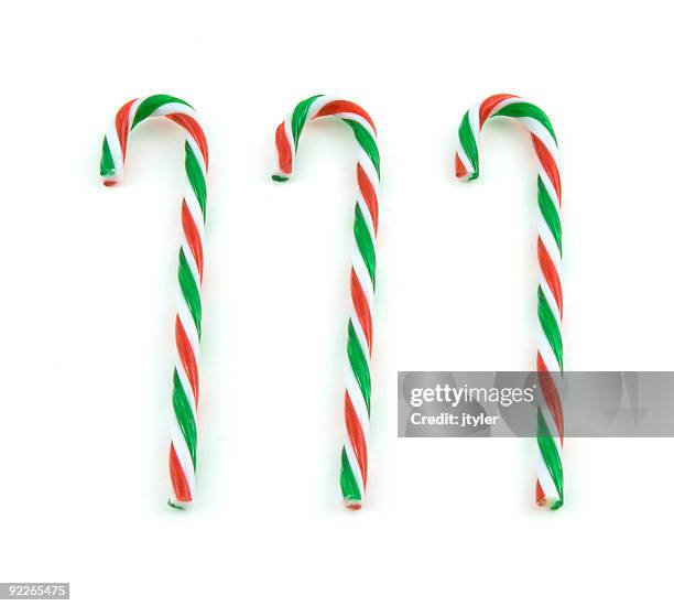 candy canes - candy cane stock pictures, royalty-free photos & images
