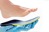 orthopedic insole in the hands