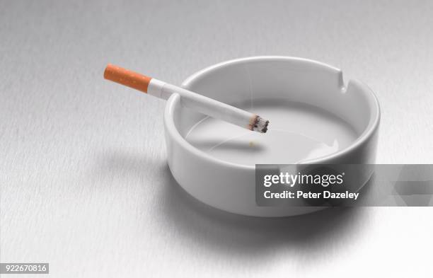 smoking lung cancer emphysema with copy space - ashtray stock pictures, royalty-free photos & images