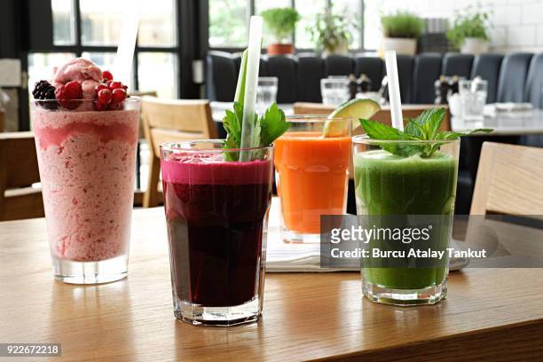 juice and smoothie glasses - detox diet stock pictures, royalty-free photos & images