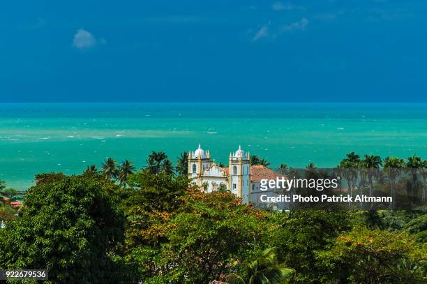 historical monument, baroque church set in tropical environment with the ocean the in the background. carmo church (igreja do carmo), olinda, pernambuco, brazil - olinda stock pictures, royalty-free photos & images