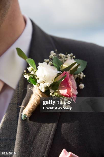 grooms wedding day buttonhole - knapphålsblomma bildbanksfoton och bilder