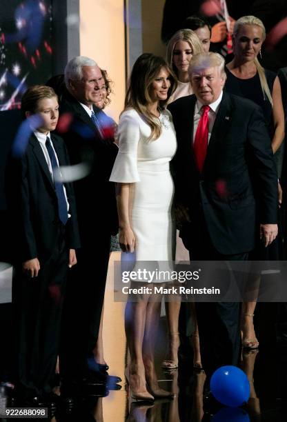 View of American real estate developer and presidential candidate Donald Trump , his wife, former model Melania Trump , and his running mate, Indiana...