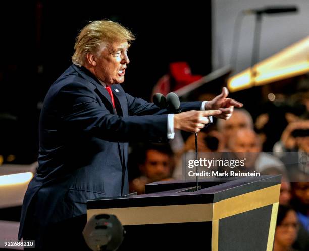 View of American real estate developer and presidential candidate Donald Trump at a podium as he addresses the Republican National Convention on its...