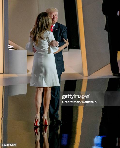 View of former model Melania Trump and her husband, real estate developer and presidential candidate Donald Trump, on stage on the final day of the...