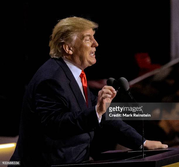 View of American real estate developer and presidential candidate Donald Trump at a podium as he addresses the Republican National Convention on its...