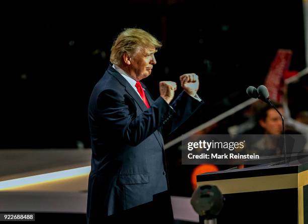 View of American real estate developer and presidential candidate Donald Trump at a podium as he addresses the Republican National Convention on its...