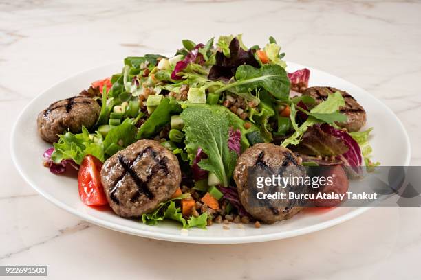 salad with meatballs - turkey meat balls stock pictures, royalty-free photos & images