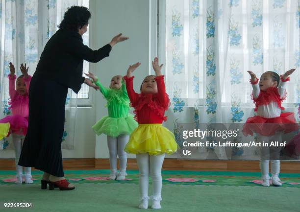 North Korean ballet dancers children in Kim Jong suk school with their teacher, Pyongan Province, Pyongyang, North Korea on May 10, 2010 in...