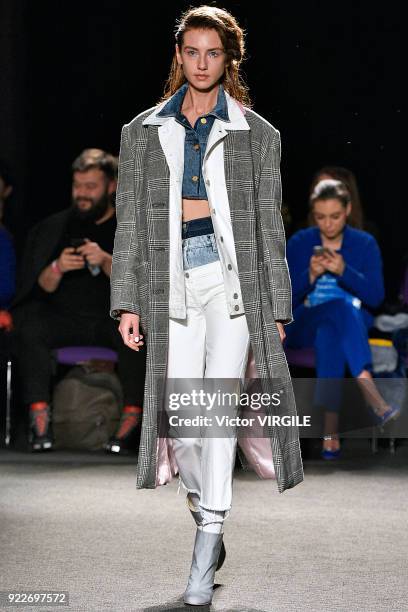 Model walks the runway at the Natasha Zinko Ready to Wear Fall/Winter 2018-2019 fashion show during London Fashion Week February 2018 on February 20,...