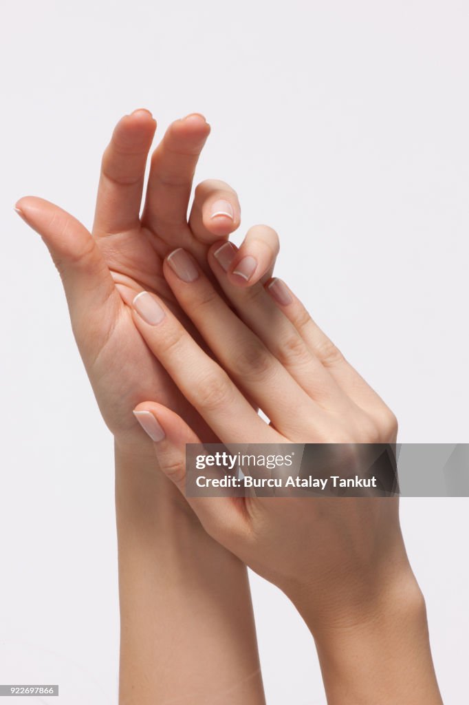 Woman's Hands with French Manicure