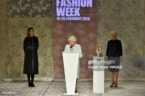 Queen Elizabeth II awards designer Richard Quinn the inaugural Queen Elizabeth II award for British Design during London Fashion Week February 2018...