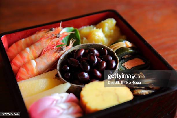 japanese traditional new year's food called osechi - kuri kinton fotografías e imágenes de stock