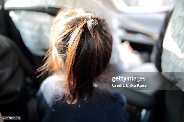 back shot of girl in car - railroad car ストックフォトと画像