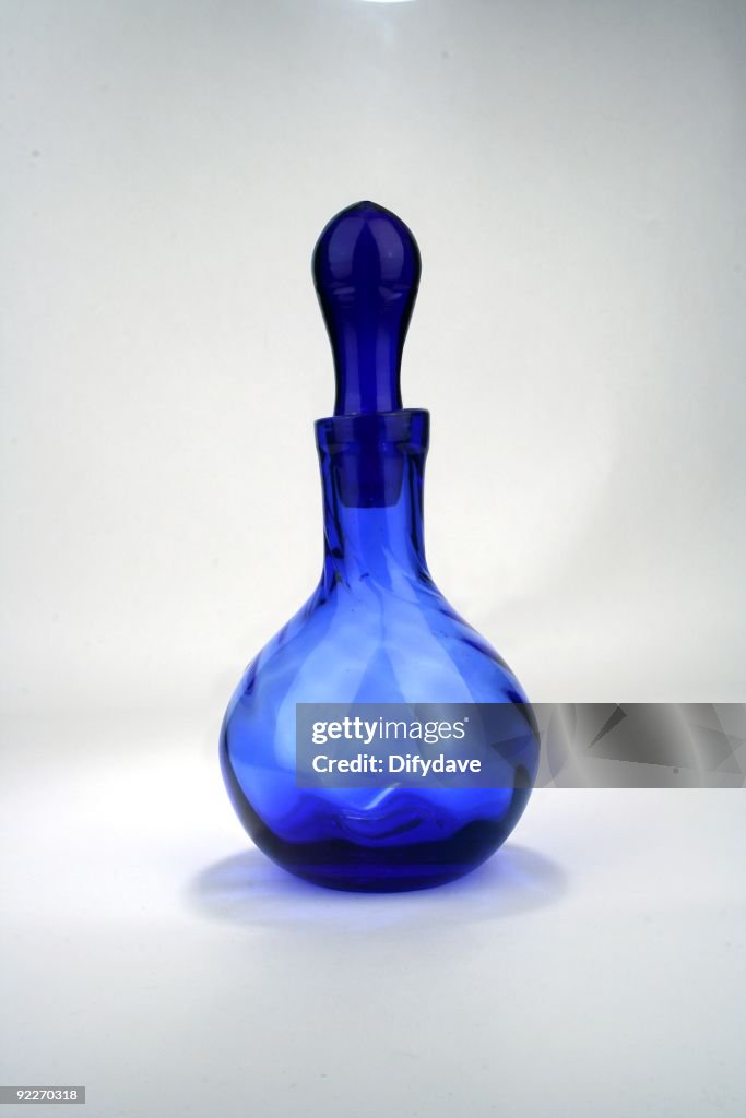 Fancy Blue Glass Bottle