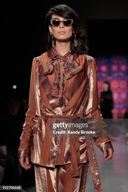 Model walks the runway during the Anna Sui fashion show; February 2018 - New York Fashion Week: The Shows at Gallery I at Spring Studios on February...