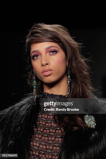 Model walks the runway during the Anna Sui fashion show; February 2018 - New York Fashion Week: The Shows at Gallery I at Spring Studios on February...