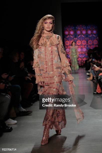 Gigi Hadid walks the runway during the Anna Sui fashion show; February 2018 - New York Fashion Week: The Shows at Gallery I at Spring Studios on...