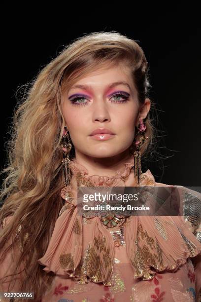 Gigi Hadid walks the runway during the Anna Sui fashion show; February 2018 - New York Fashion Week: The Shows at Gallery I at Spring Studios on...