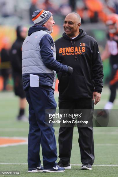 Head Coach John Fox of the Chicago Bears and Head Coach Marvin Lewis of the Cincinnati Bengals share a moment at midfield before their game at Paul...