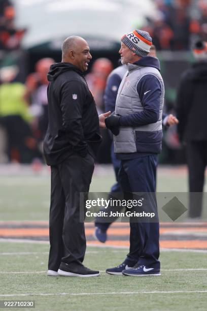 Head Coach John Fox of the Chicago Bears and Head Coach Marvin Lewis of the Cincinnati Bengals share a moment at midfield before their game at Paul...