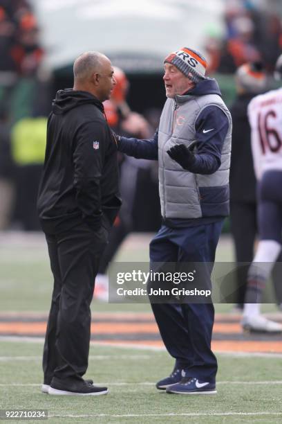 Head Coach John Fox of the Chicago Bears and Head Coach Marvin Lewis of the Cincinnati Bengals share a moment at midfield before their game at Paul...