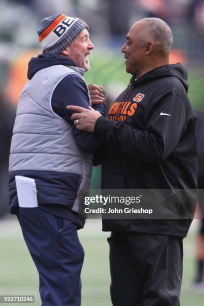 Head Coach John Fox of the Chicago Bears and Head Coach Marvin Lewis of the Cincinnati Bengals share a moment at midfield before their game at Paul...