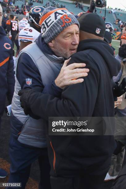 Head Coach John Fox of the Chicago Bears and Head Coach Marvin Lewis of the Cincinnati Bengals share a moment at midfield after their game at Paul...