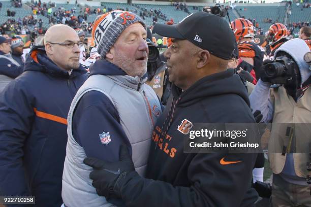 Head Coach John Fox of the Chicago Bears and Head Coach Marvin Lewis of the Cincinnati Bengals share a moment at midfield after their game at Paul...