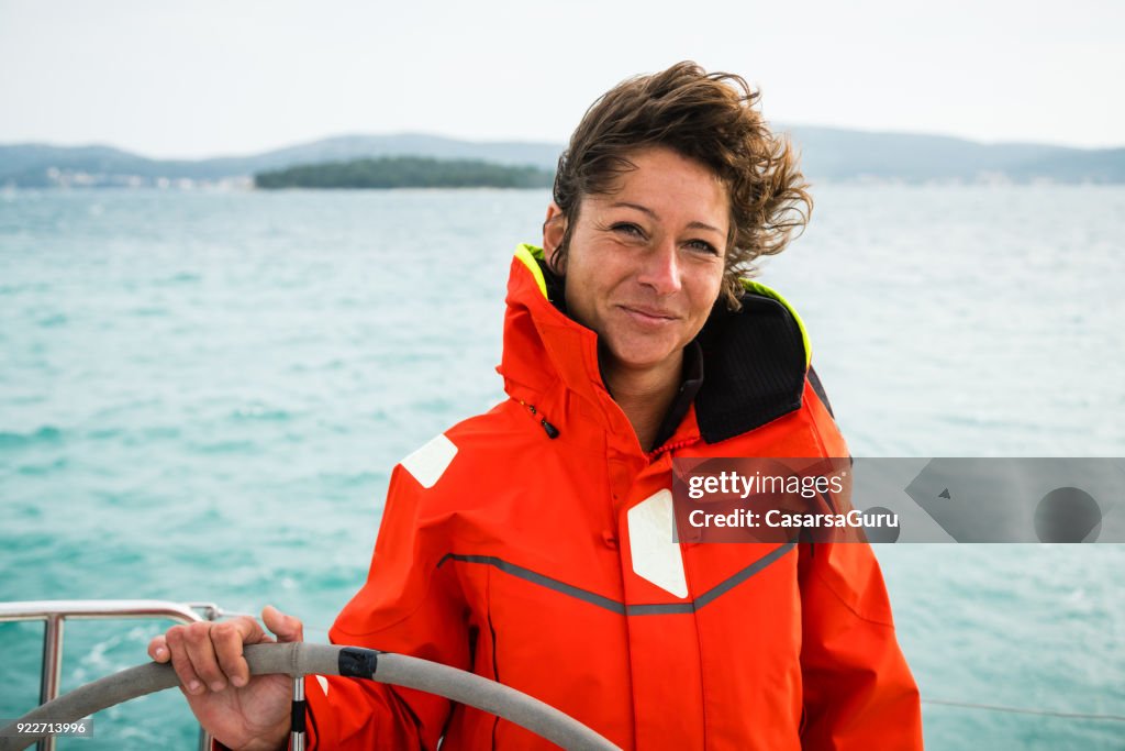 Adult Woman Holding the Rudder