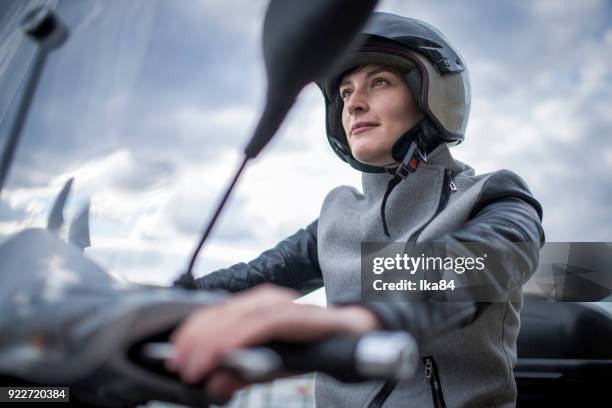girl with helmet - girl riding scooter stock pictures, royalty-free photos & images