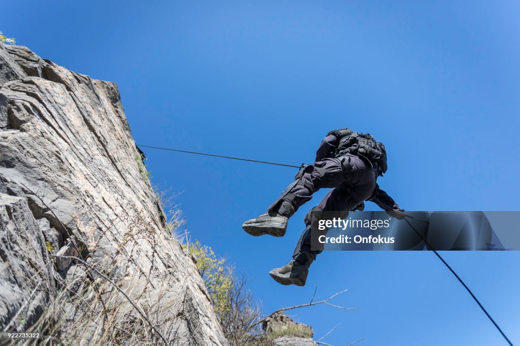 Swat Police Officer Rappelling
