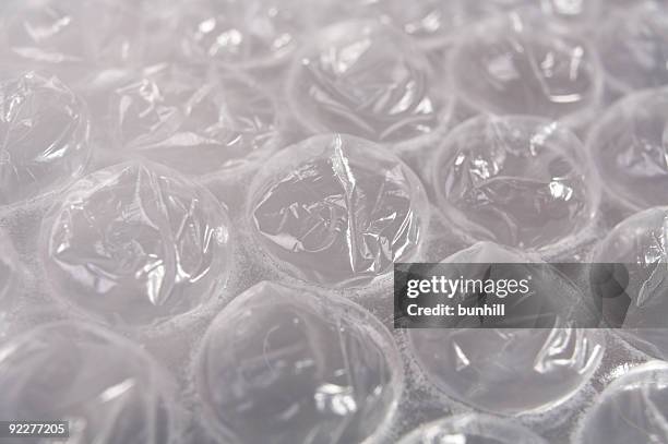 plastic protective bubble wrap - bubble wrap stock pictures, royalty-free photos & images