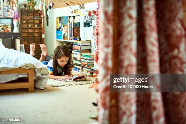 girl playing in bedroom - girl soles stock pictures, royalty-free photos & images