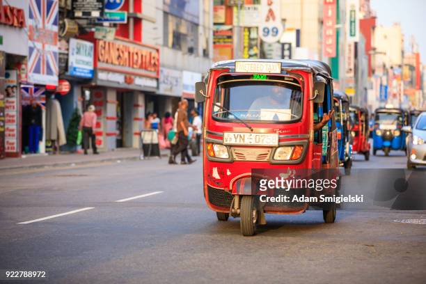 tuktuk taxi on the streets of colombo; sri lanka - tourism in the cultural capital of sri lanka stock pictures, royalty-free photos & images