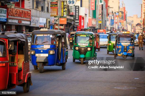 tuktuk taxi on the streets of colombo; sri lanka - auto rickshaw stock pictures, royalty-free photos & images