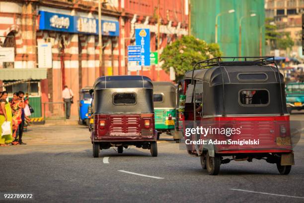 tuktuk taxi on the streets of colombo; sri lanka - tourism in the cultural capital of sri lanka stock pictures, royalty-free photos & images