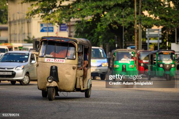 tuktuk taxi on the streets of colombo; sri lanka - tourism in the cultural capital of sri lanka stock pictures, royalty-free photos & images