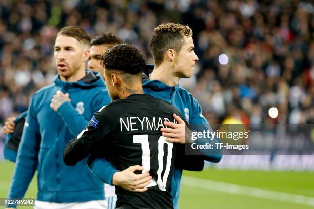Cristiano Ronaldo of Real Madrid hugs Neymar of Paris Saint-Germain during the UEFA Champions League Round of 16 First Leg match between Real Madrid...
